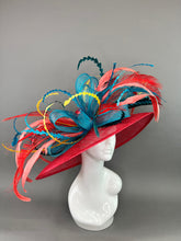 Load image into Gallery viewer, RED WIDE BRIM WITH TEAL BOW AND FEATHERS.