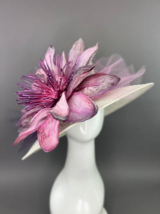 PURPLE FLORAL BLOOM ON LIGHT IVORY BASE.