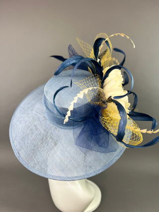 COUNTRY BLUE ROUND BRIM HAT WITH CREAM FLOWER BLOOM