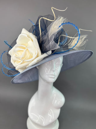 LIGHT BLUE OVAL DERBY HAT WITH CREAM FLORAL BLOOM