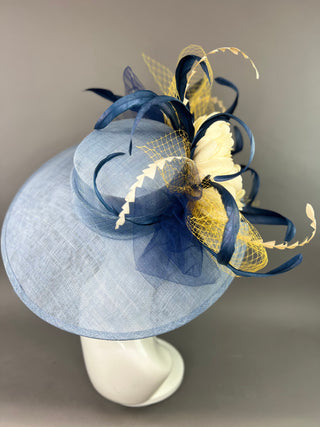 COUNTRY BLUE ROUND BRIM HAT WITH CREAM FLOWER BLOOM