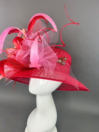 RED ROUND BRIM HAT WITH PINK FLOWER