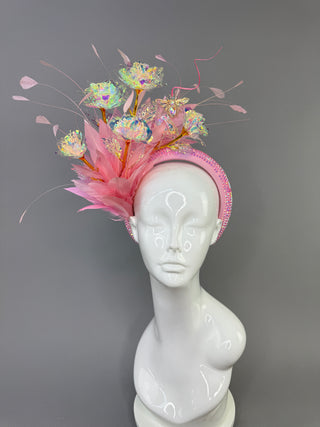 LIGHT PINK HEADBAND FASCINATOR WITH IRIDESCENT ROSES.