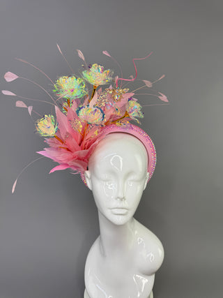 LIGHT PINK HEADBAND FASCINATOR WITH IRIDESCENT ROSES.