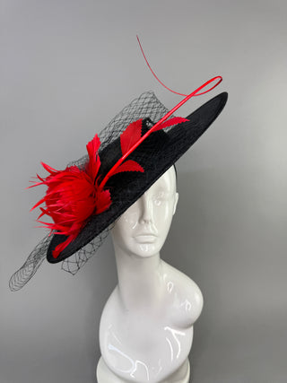 BLACK BOATER HAT WITH RED FEATHER ROSE.