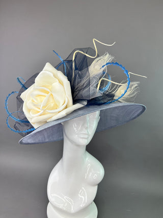 LIGHT BLUE OVAL DERBY HAT WITH CREAM FLORAL BLOOM