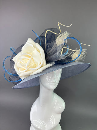 LIGHT BLUE OVAL DERBY HAT WITH CREAM FLORAL BLOOM