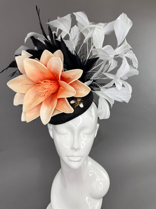 BLACK AND WHITE FEATHER FASCINATOR WITH PEACH BLOOM