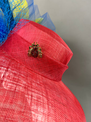 RED ROUBD BRIM WITH YELLOW FLOWER