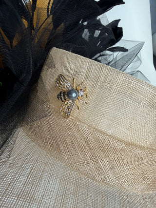 NUDE WIDE BRIM WITH METALLIC GOLD BLOOM AND BLACK FEATHER SPRAYS