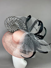 Load image into Gallery viewer, BLUSH PINK HAT WITH BLACK AND WHITE ACCENTS.