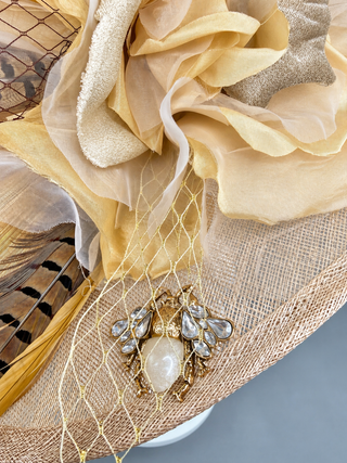 “CAMEL TOBACCO” NUDE WIDE BRIM KENTUCKY DERBY HAT WITH PHEASANT FEATHERS
