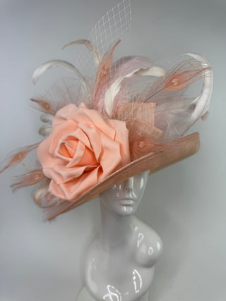 The Bloom designer derby hat by The Hat Hive featuring peach and light pink sinamay with a large floral bloom and signature jeweled bee."