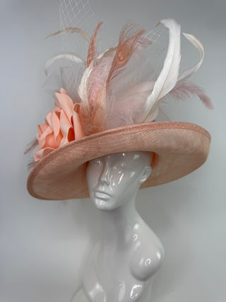 The Bloom light pink and peach designer hat, a statement headpiece perfect for the Kentucky Derby, weddings, and garden parties.