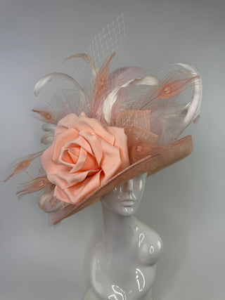 The Bloom light pink and peach designer hat, a statement headpiece perfect for the Kentucky Derby, weddings, and garden parties.