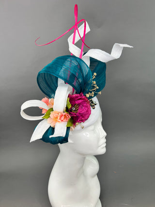 Handcrafted white silk abaca fascinator with teal ribbon and deep magenta flowers, perfect for the Kentucky Derby or a wedding.