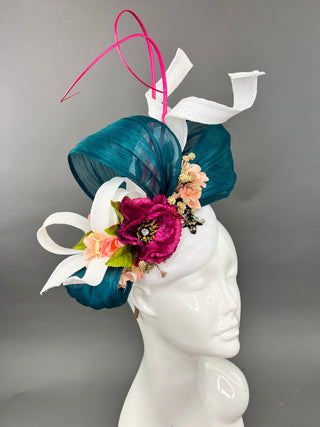 Handcrafted white silk abaca fascinator with teal ribbon and deep magenta flowers, perfect for the Kentucky Derby or a wedding.
