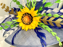 Load image into Gallery viewer, Light blue, faded denim sinamay hat base adorned with royal blue, white and green hand trimmed feathers perfect for the Kentucky Derby, Church, Wedding, Bridal Shower, Wedding or any special occasion 