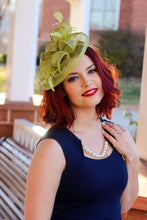 Load image into Gallery viewer, Olive Green Fascinator on headband for easy wear. Style: &quot;The Kenni&quot; Women&#39;s Tea Party Hat, Church Hat, Derby Hat, wedding hat