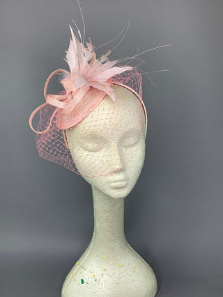 Light Pink Fascinator with veil attaches with headband, - The Hat Hive